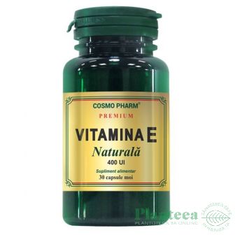 flacon verde cu eticheta de culoare aurie pe care scrie vitamina e naturala